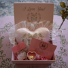 Neiima’s Gems Love Bundle featuring a gold-plated locket and keepsakes.