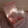 Romantic gift set including a gold heart locket, love pillow, and keepsake box
