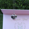 Elegant white gold love locket necklace with a heart-shaped pendant