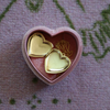 Sentimental gold locket necklace, ideal for meaningful gifts